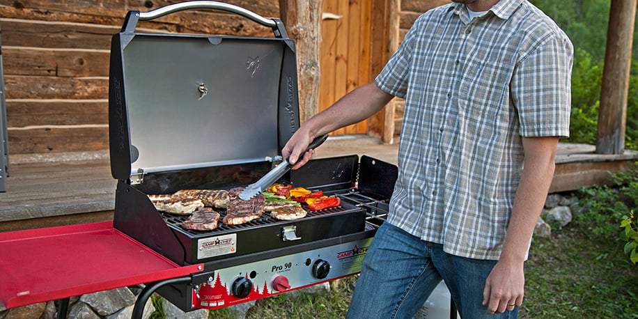 Cooking burgers, chicken, and vegetables on a BBQ Box on a Pro 90 stove.