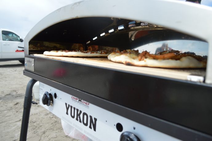 pizzas in the camp oven