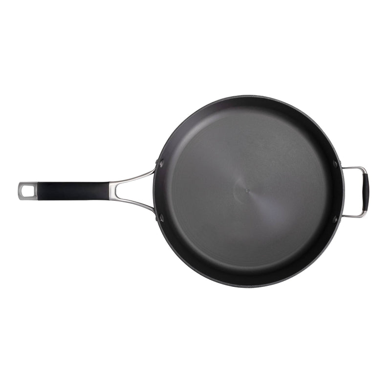 Load image into Gallery viewer, The Camp Chef Heritage Skillets is a black nonstick frying pan with excellent heat retention, a long handle, and a small helper handle opposite, seen from above on a white background.
