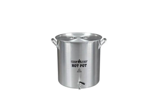 The Camp Chef Hot Water Pot is a large silver metal stock pot with handles, lid, and bottom spigot—ideal as an outdoor beverage dispenser for hot drinks at the campsite.