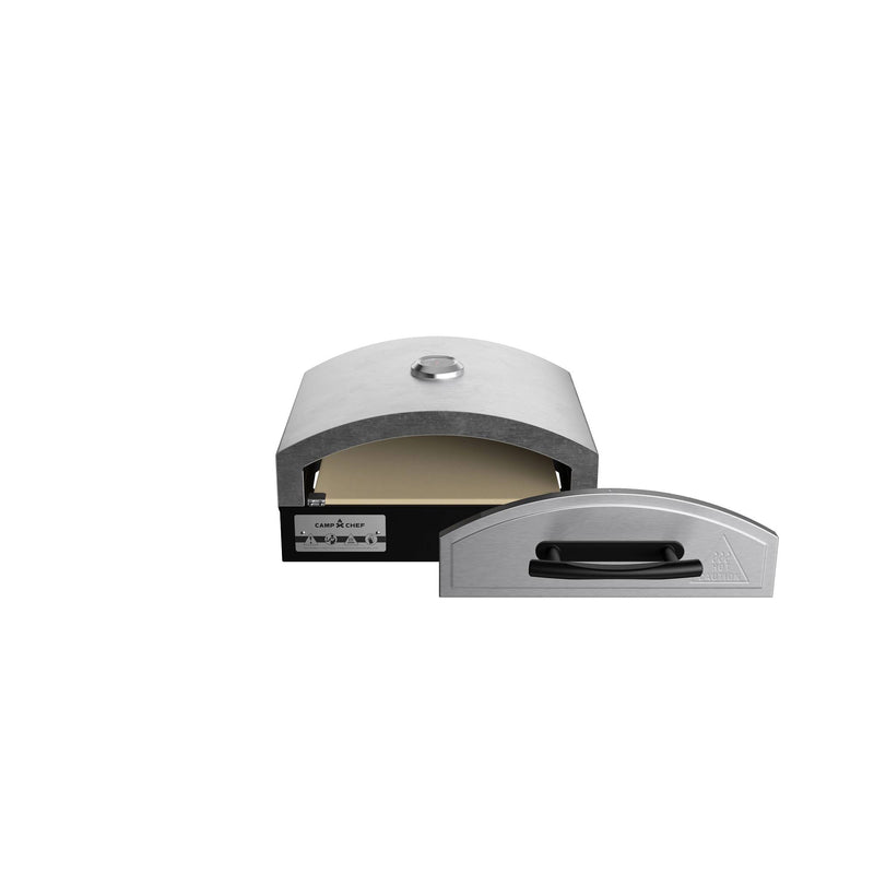 Load image into Gallery viewer, The Camp Chef Artisan Pizza Ovens 14 is a compact stainless steel outdoor oven with a removable front door to reveal its ceramic stone interior, curved top, and sleek black base.
