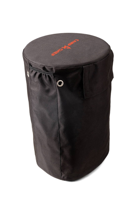 The Camp Chef Propane Tank Cover is a black cylindrical fabric bag with metal grommets, flap pocket, and red logo on top—a perfect camping accessory or tank cover, shown on a white background.