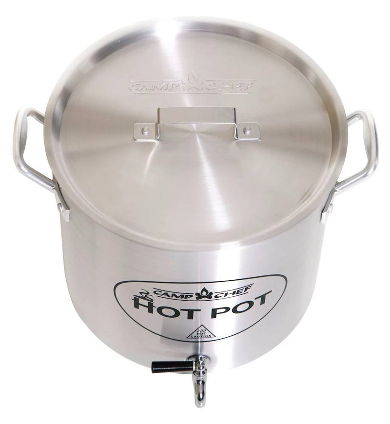 Load image into Gallery viewer, The Camp Chef Hot Water Pot is a large stainless steel container with two side handles, a lid, and a bottom spigot—ideal as an outdoor beverage dispenser for campsite hot drinks. The front label reads "Hot Water Pot.
