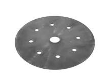 The Camp Chef Flame Tamer is a smooth, round raw steel disk with a central hole and eight evenly spaced smaller holes. Its metallic design makes it an ideal heat diffuser for efficient cooking control.