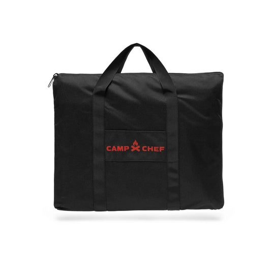 The Camp Chef Griddle Bag - 1 Burner is a weather-resistant black bag with two handles, a front pocket, zipper closure, and features the red Camp Chef logo and flame icon. Designed for the Fry Griddle, it’s shown on a white background.