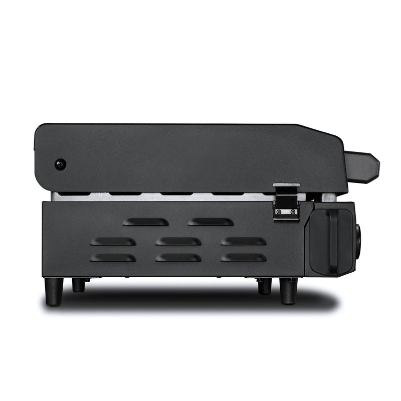Load image into Gallery viewer, Side view of the Camp Chef Gridiron Gameday, a black electric kitchen appliance with lower vents and a right-side latch, possibly used as a panini press or portable grill, displayed against a white background.
