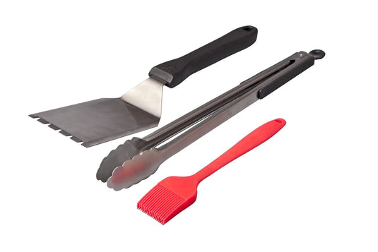 The Camp Chef BBQ Tool Set includes a metal spatula and tongs with black handles and a red silicone basting brush—perfect additions to your barbecue accessories collection.