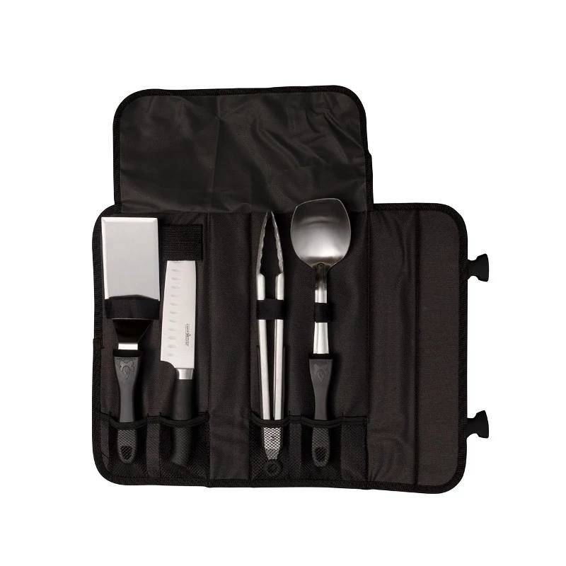 Load image into Gallery viewer, The Camp Chef 5 Piece All Purpose Chef Set features a black roll-up case with four stainless steel utensils—spatula, knife, tongs, and spoon—each with a black handle in its own slot. Ideal for grilling or camp cooking.
