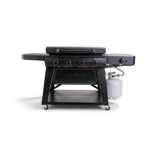 The Camp Chef Gridiron Pro Flat Top Grill is a large black outdoor cooker with multiple red knobs, a side burner, storage shelf, and right-side propane tank, all set on wheels for easy mobility.