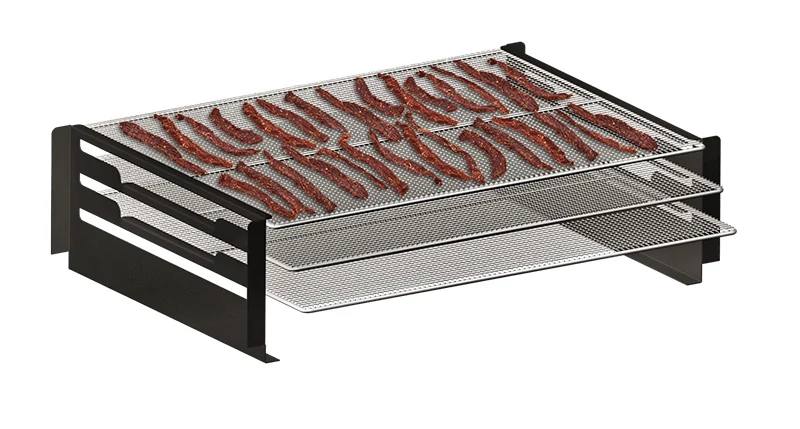 Load image into Gallery viewer, The Camp Chef Pellet Grill Jerky Racks feature three mesh trays in a black metal frame, letting you maximize your pellet grill's cooking area by holding strips of seasoned meat or other foods.
