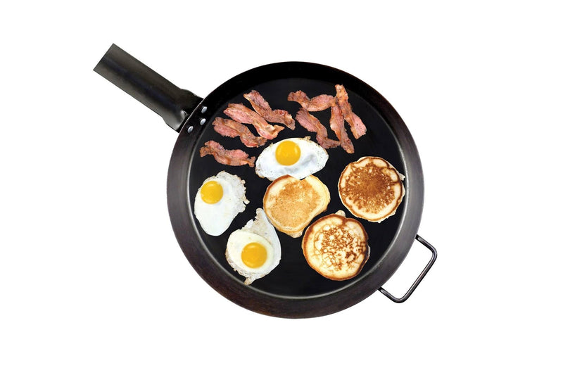 Load image into Gallery viewer, The Camp Chef Lumberjack Skillet - 16” can hold three sunny-side-up eggs, three pancakes, and several strips of bacon, all displayed on a white background.
