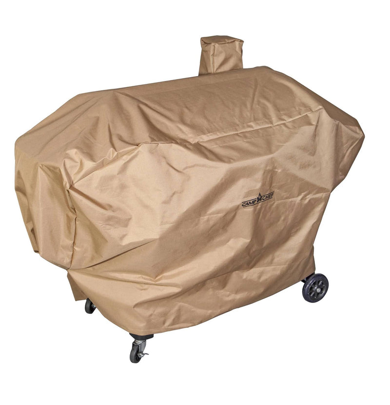 Load image into Gallery viewer, The Camp Chef Pellet Grill Cover fits pellet grill smokers with wheels and a chimney slot. Its snug fit, small front logo, and durable design protect your outdoor grill from the elements on your patio.

