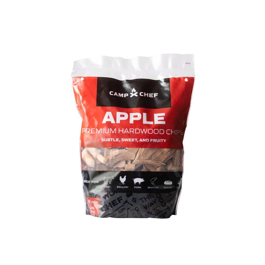 Camp Chef Wood Chips in red, black, and white packaging are labeled “subtle, sweet, and fruity,” making them perfect for smoking poultry, pork, seafood, or baking.