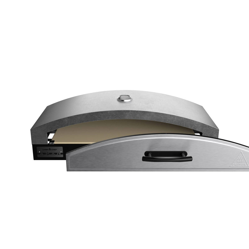 Load image into Gallery viewer, The Camp Chef Artisan Pizza Ovens 14 features a stainless steel build, curved top, and front handle. Its partially open design reveals an interior ceramic stone, perfect for making delicious pizzas outdoors.
