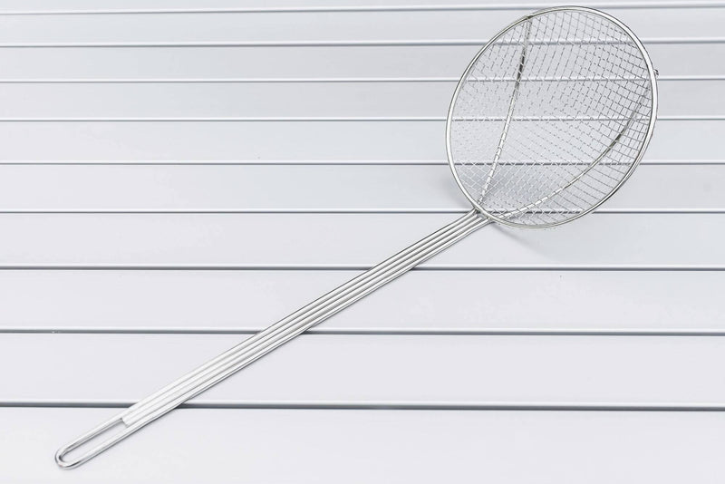 Load image into Gallery viewer, The Camp Chef Long Handled Skimmer, featuring a round fine wire mesh basket and nickel plated handle, rests on a white slatted surface.
