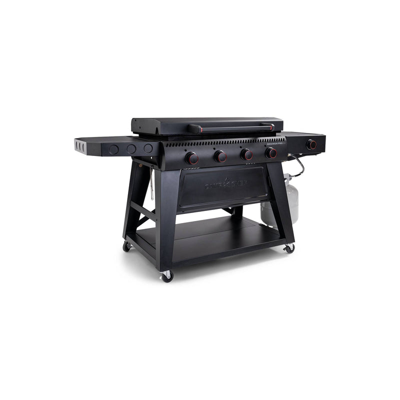 Load image into Gallery viewer, The Camp Chef Gridiron Pro Flat Top Grill is a large black outdoor propane griddle with four red knobs, side shelves, lower storage shelf, propane tank, and wheels—ideal for your outdoor cooking system.
