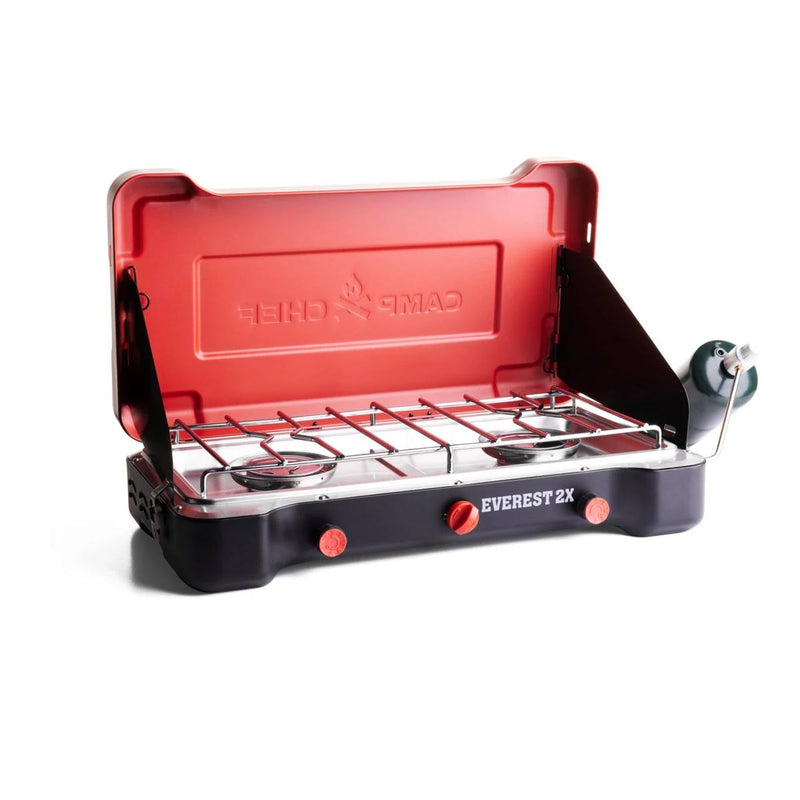 Load image into Gallery viewer, The Camp Chef Everest 2X is a portable 2-burner camping stove with a red lid, black base, control knobs, open-top burners, and a right-side propane attachment—ideal for outdoor cooking.

