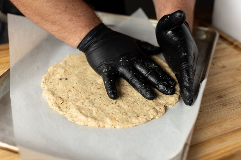 shaping a gluten free pizza 