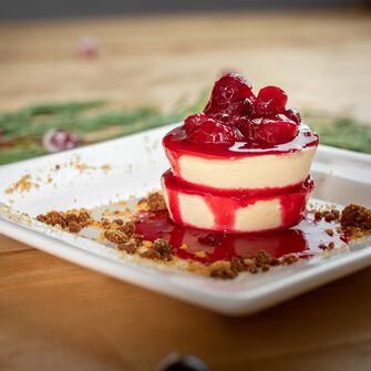 Mini Cheesecakes with Orange Cranberry Sauce