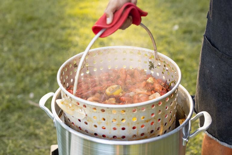 lifting the basket out of the pot