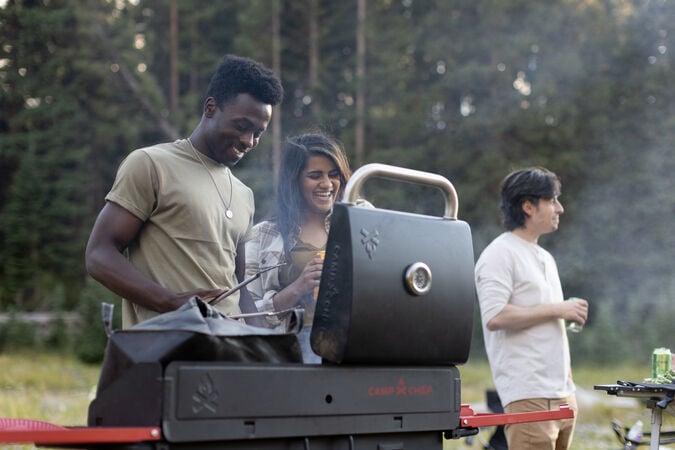 Couple cooking on a Pro 14 stove Couple cooking on a Pro 14 stove