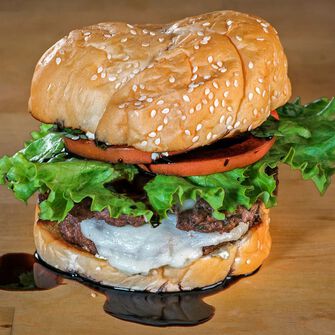 Caprese Burgers with Artichoke Pesto Sauce Caprese Burgers with Artichoke Pesto Sauce