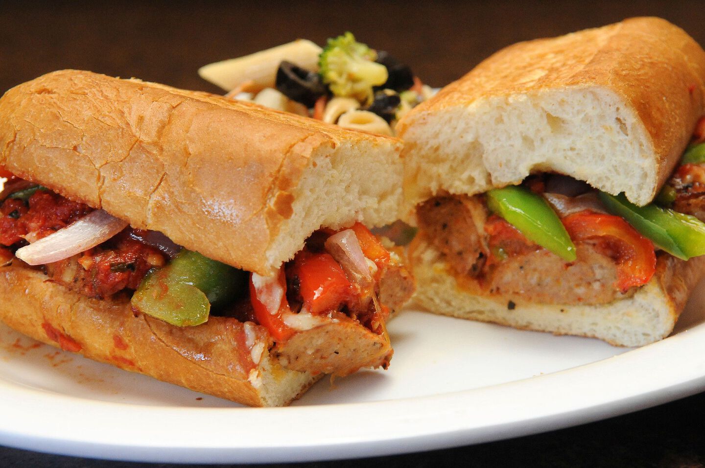 Dutch Oven Sausage and Peppers Sandwich