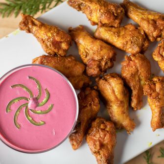 Spiced Chicken Wings with Cranberry Sauce