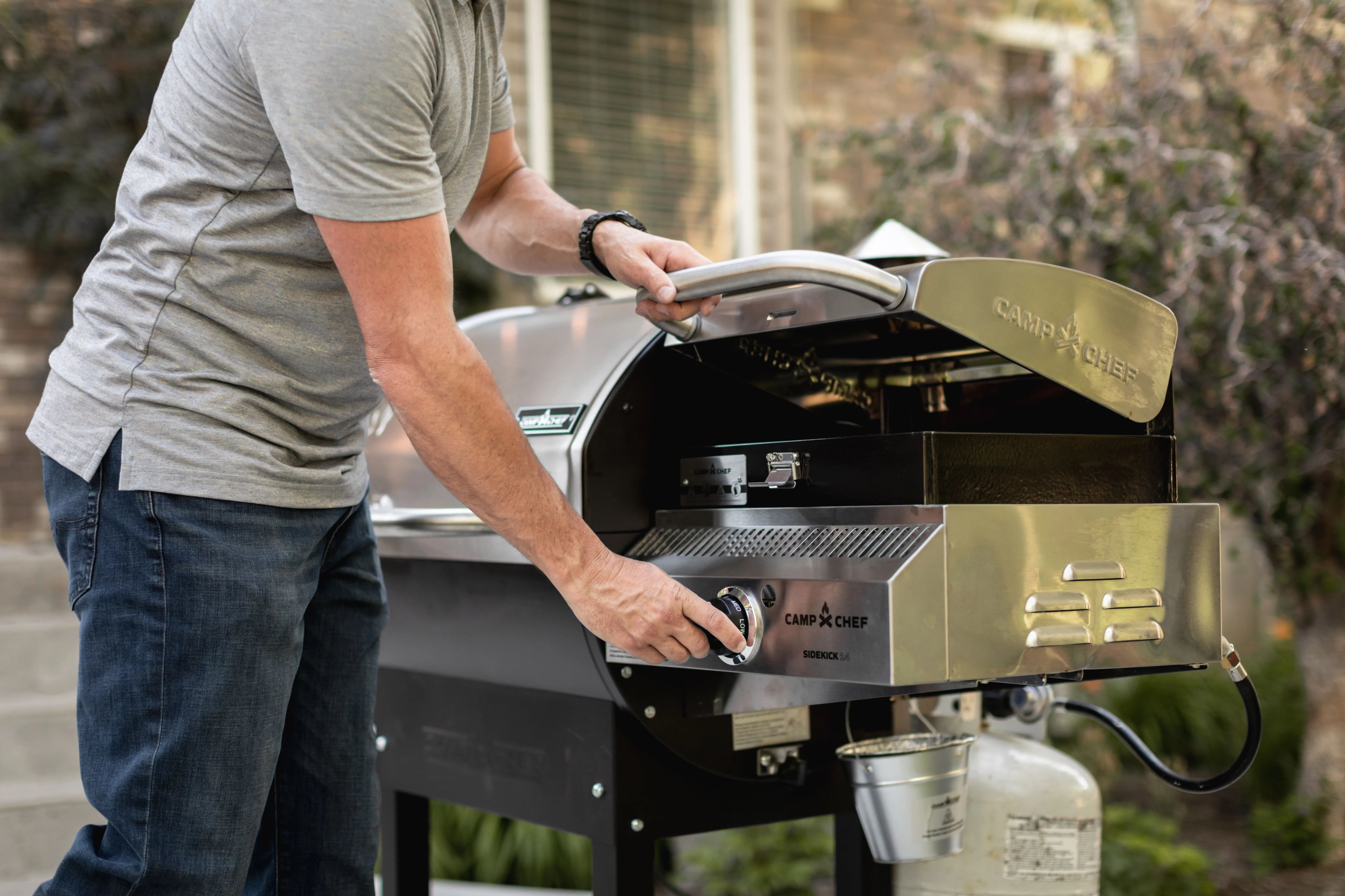 Pellet grill top with sear box
