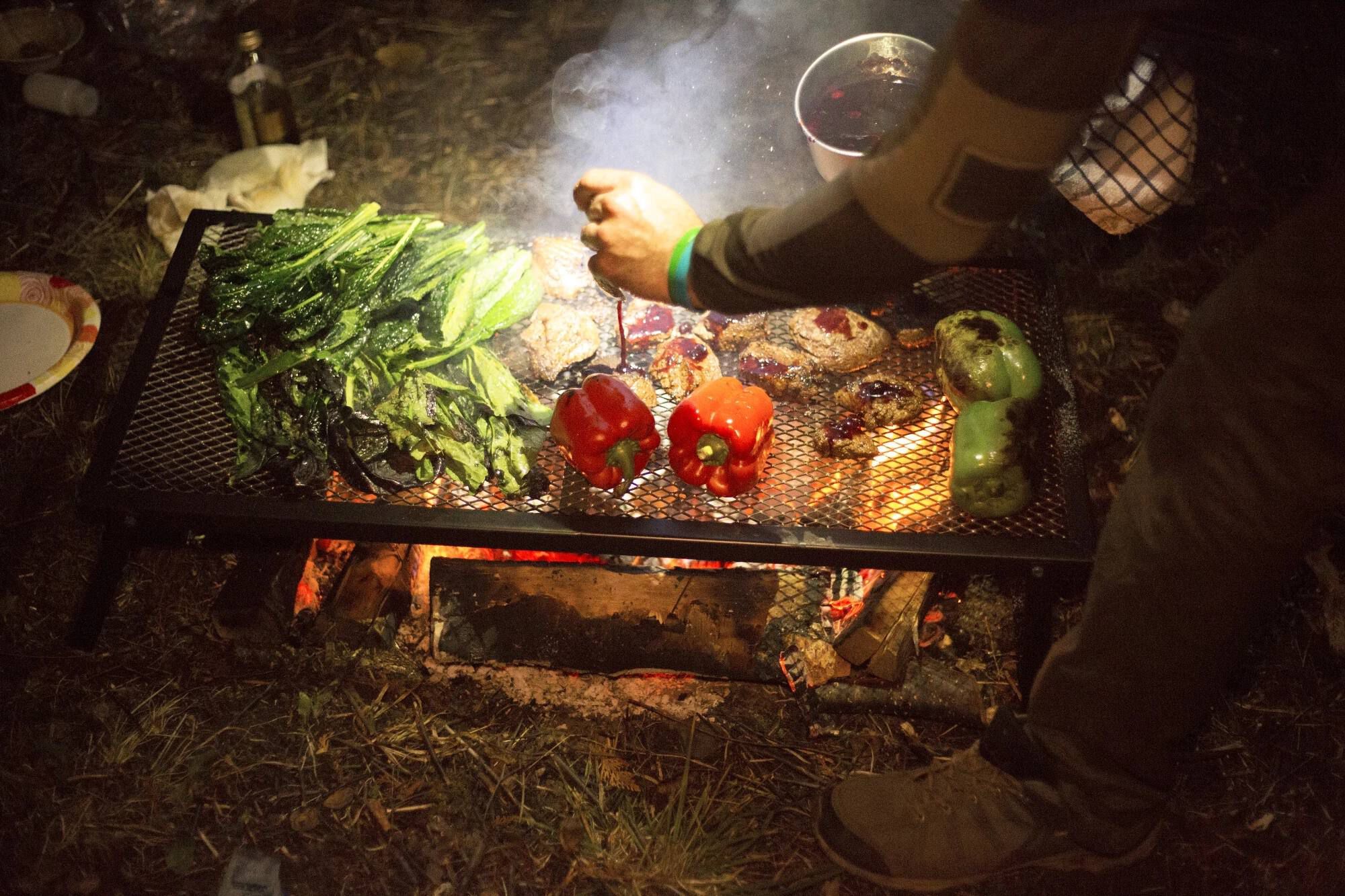 Camp chef lumberjack on sale over fire grill